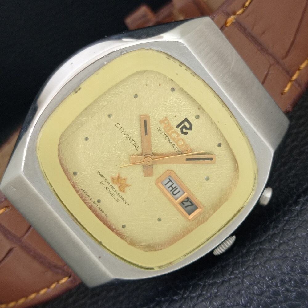 Vintage 1974 Ricoh Automatic Mens Silver Watch W/daydate & Champagne accents